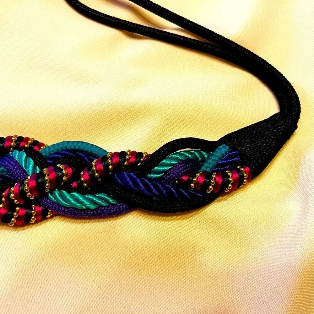 Vintage 1980s vivid multicolor women’s braided belt. OS